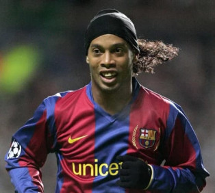 Barcelona legend Ronaldinho returns to the club as an ambassador